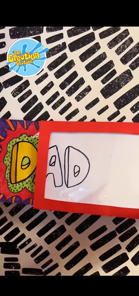 Sliding the magic card into the frame to reveal the full-colour Father’s Day design
